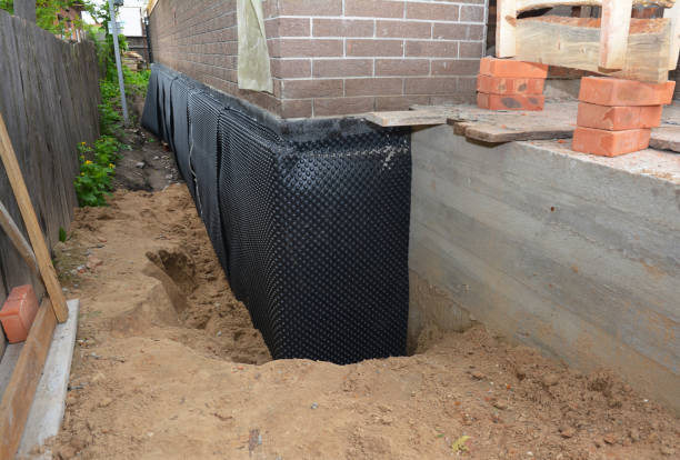 Happy homeowners after waterproofing job in Stony Ridge